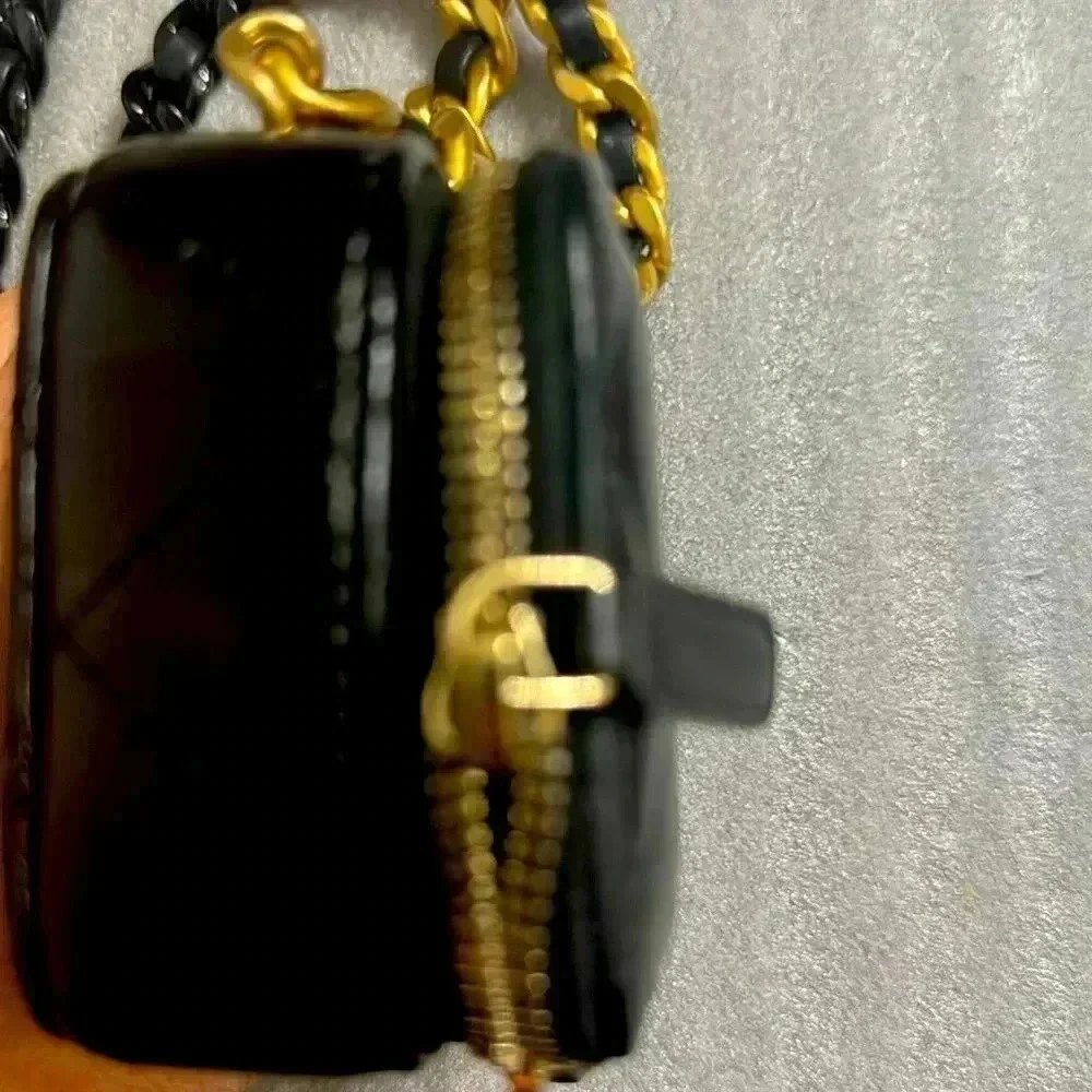 Chanel Black Quilted Mini Lacquered Chain Clutch in lambskin leather